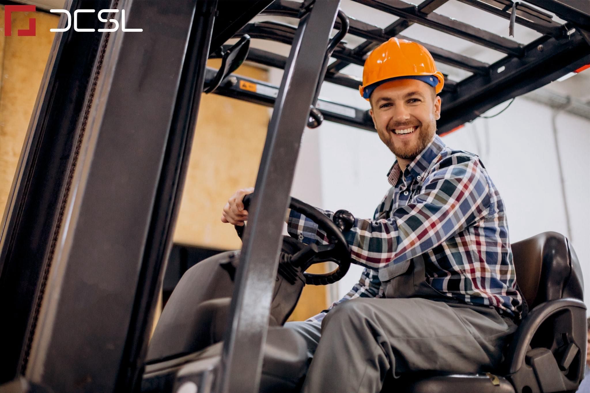 Operator managing heavy packages with clamp rotator